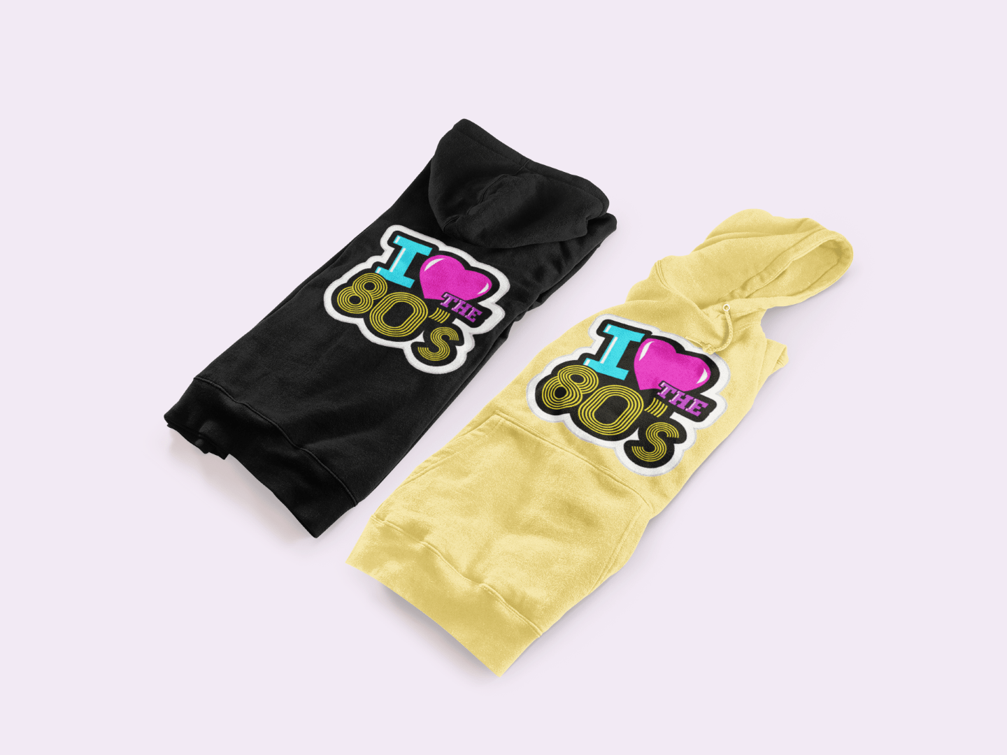mockup-of-two-folded-hoodies-next-to-each-other-3591-el1-1.png Mikina s potlačou – I love the 80s – Obrázok 1